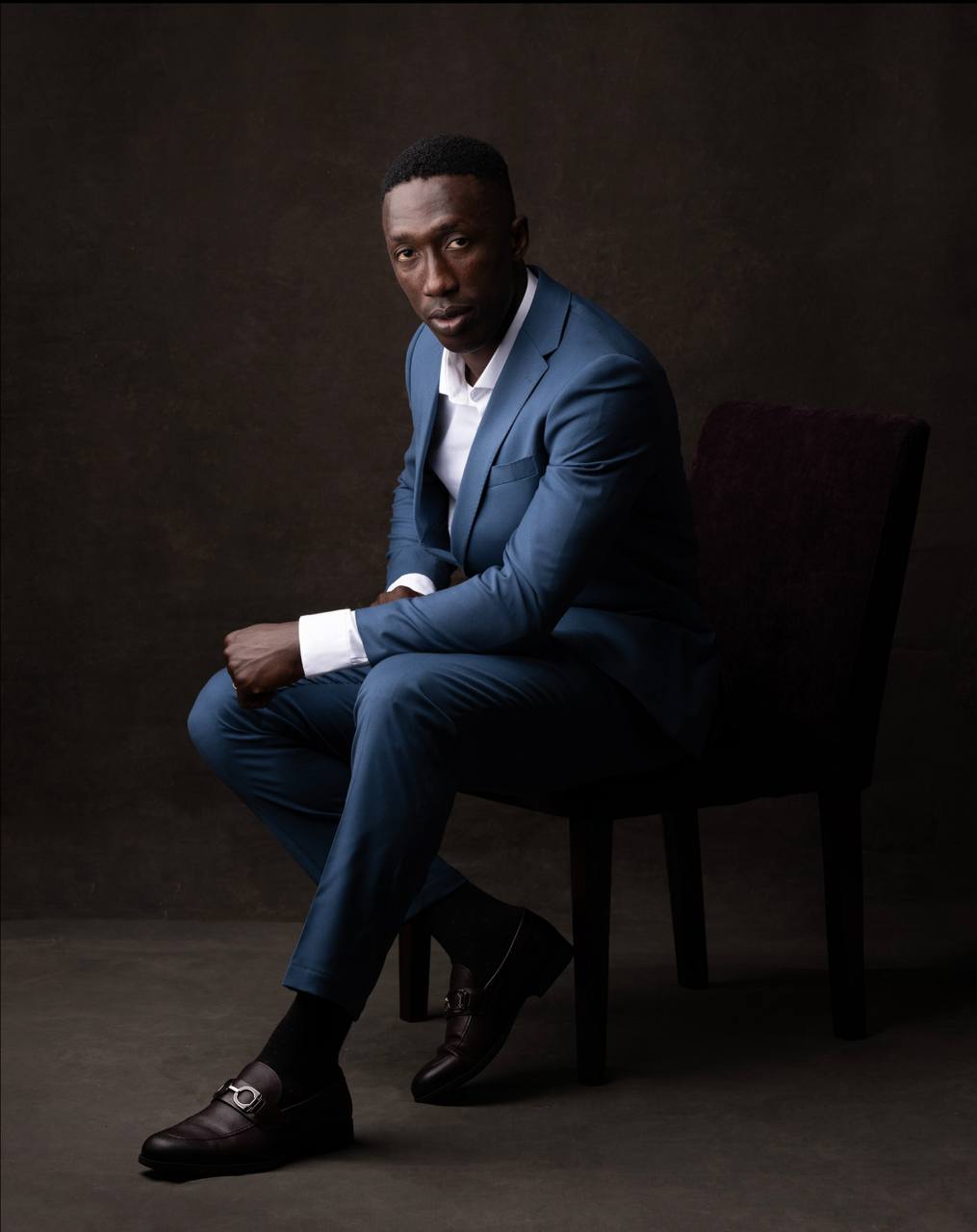 Model — Blue tailoring · Studio portrait
